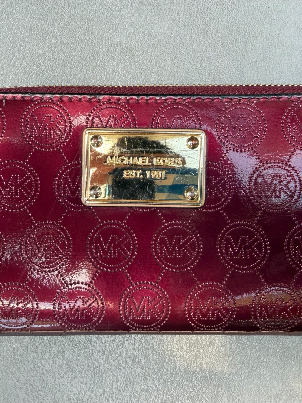 Michael Kors Burgundy Patent Logo Wallet with Gold Plate
